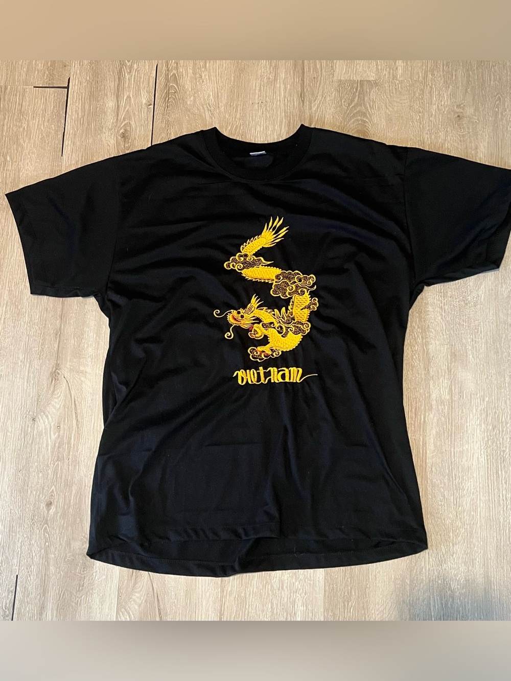 Black Men’s T‑Shirt with Yellow Dragon Graphic